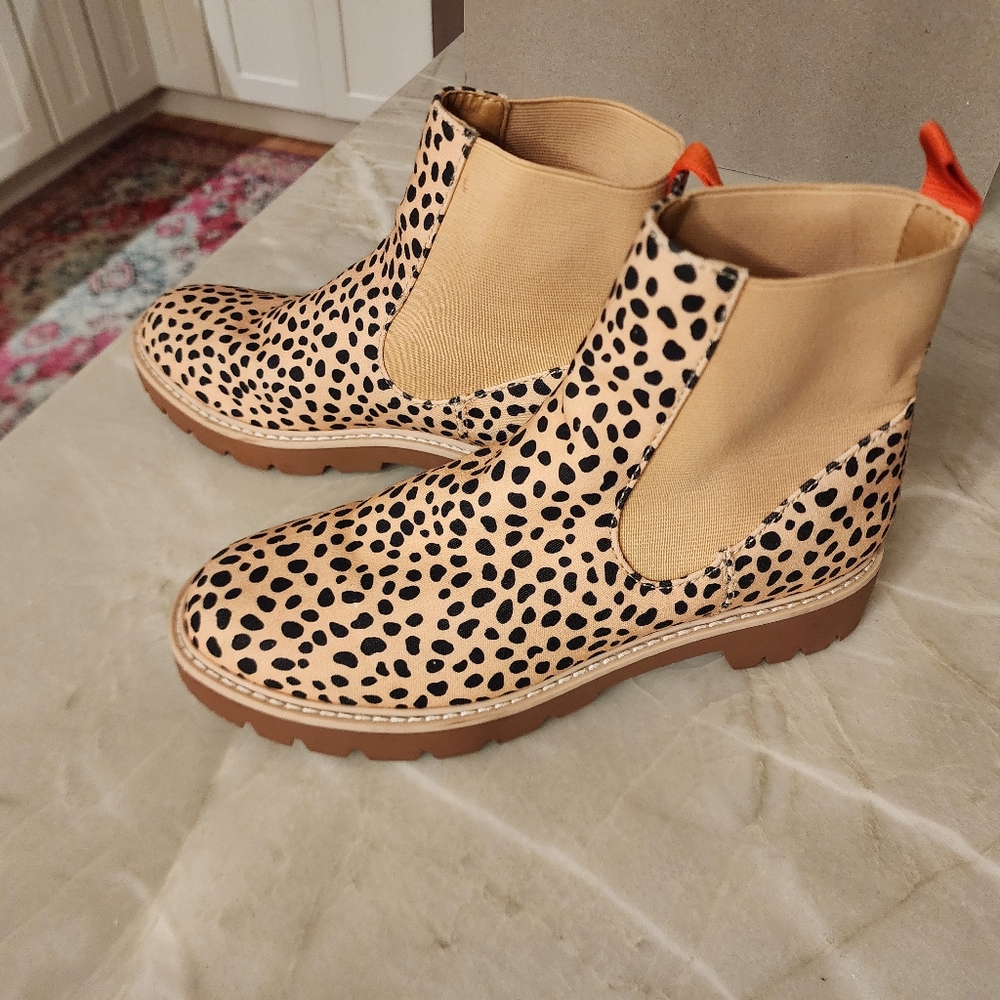Dolce Vita pull on leopard print boots.